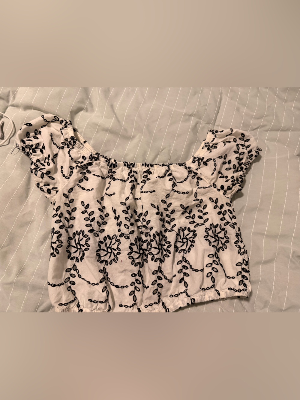American Eagle Outfitters White Off-Shoulder Top with Black Floral Embroidery